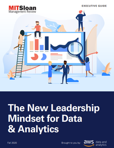 Business people looking at and standing on a chart of stats - whitepaper from AWS