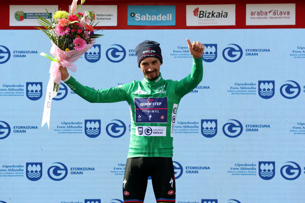 AMURRIO SPAIN APRIL 06 Julian Alaphilippe of France and Team QuickStep Alpha Vinyl celebrates at podium as Green Points Jersey winner during the 61st Itzulia Basque Country 2022 Stage 3 a 1817km stage from Llodio to Amurrio itzulia WorldTour on April 06 2022 in Amurrio Spain Photo by Gonzalo Arroyo MorenoGetty Images