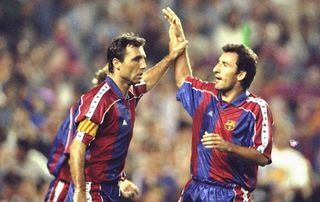 24 Sep 1994: Hristo Stoichkov (left) of Barcelona celebrates his hat-trick with team mate Txiki Begiristain during a match.