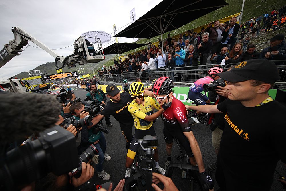 Geraint Thomas (Team Ineos) congratulates Egan Bernal after stage 20 of the Tour de France
