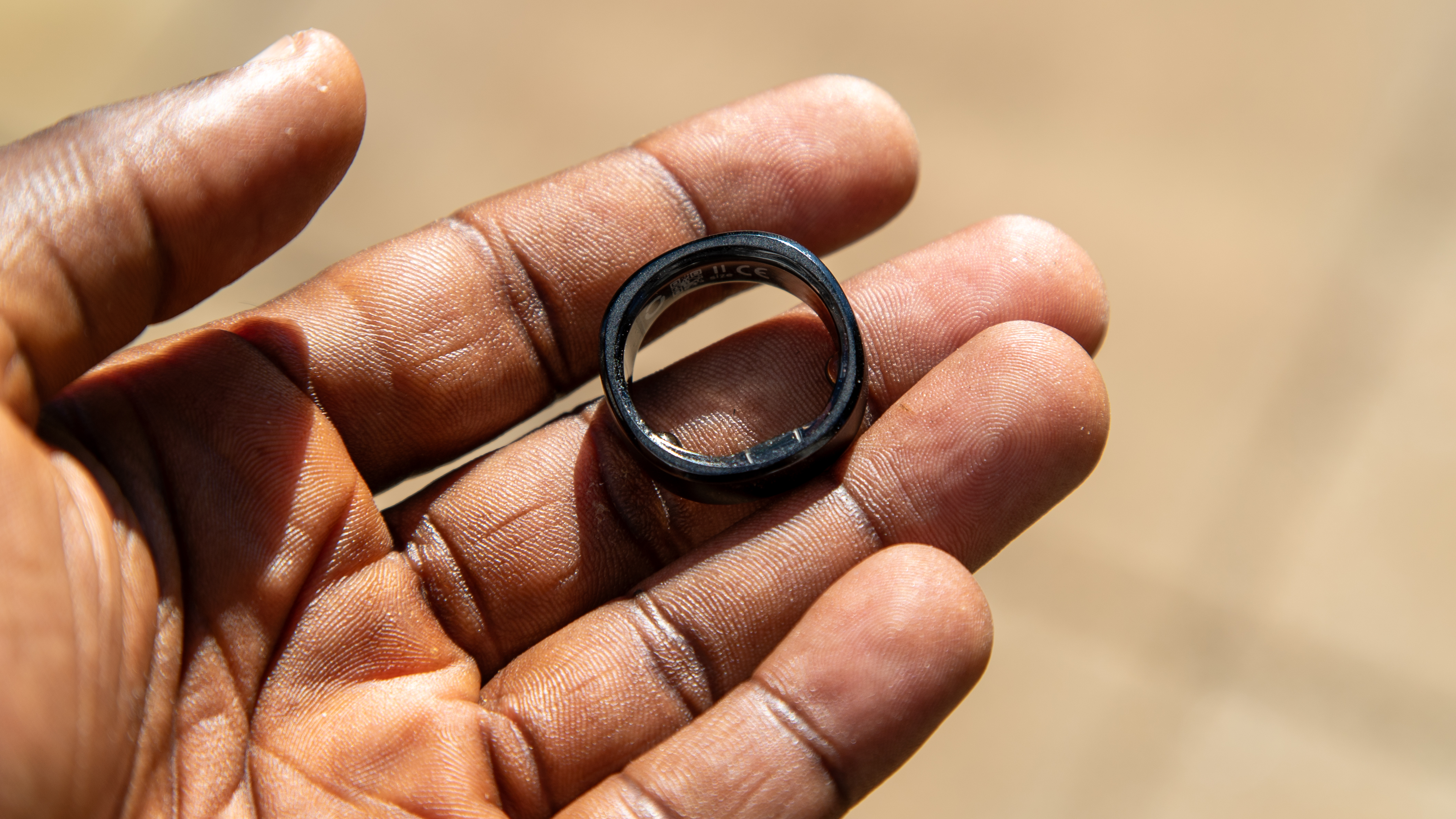 The RingConn Smart Ring in hand