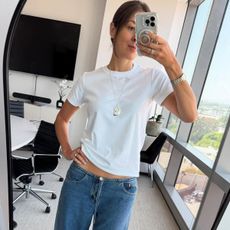 Fashion editor, Judith Jones wearing a white t-shirt and low-rise jeans