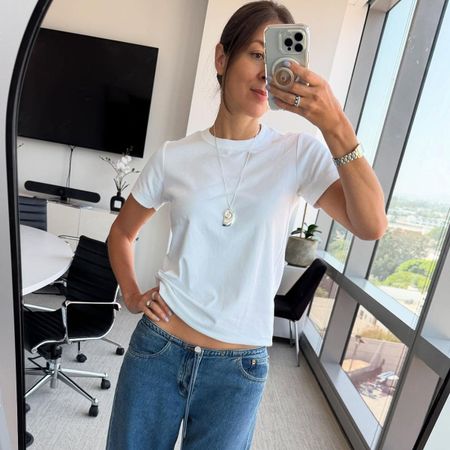 Fashion editor, Judith Jones wearing a white t-shirt and low-rise jeans
