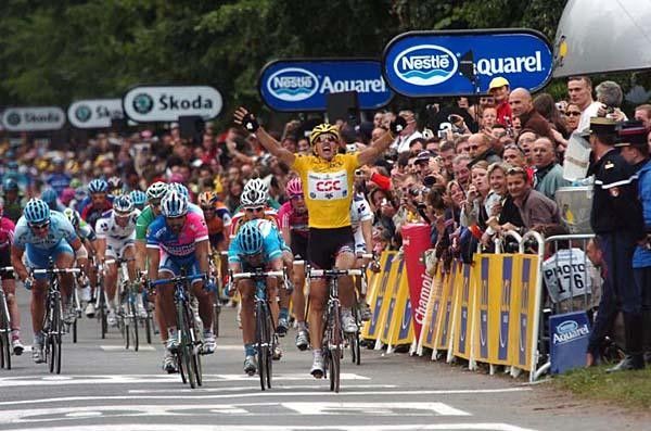 The stage winner celebrates before Zabel, who is not unfamiliar with runner-up.