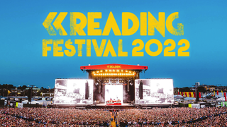 Reading Festival logo above a heaving crowd enjoying music in front of a large stage