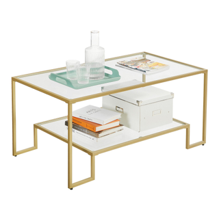 A two-tier glass and gold metal coffee table
