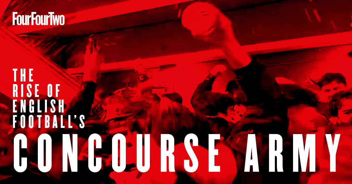 Football fans singing, drinking and celebrating inside a football stadium concourse