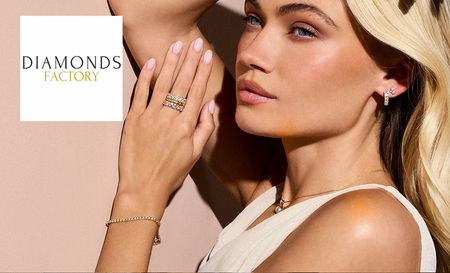 Woman wearing Diamond Factory's diamond ring and bracelet