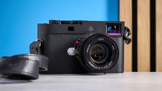 A black Leica M11-D rangefinder camera