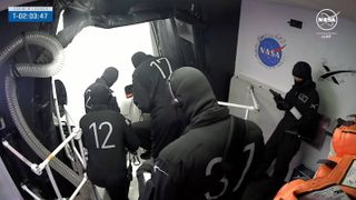 SpaceX technicians seal the hatch of Crew Dragon Endeavour ahead of the planned Crew-8 astronaut launch on March 3, 2024.