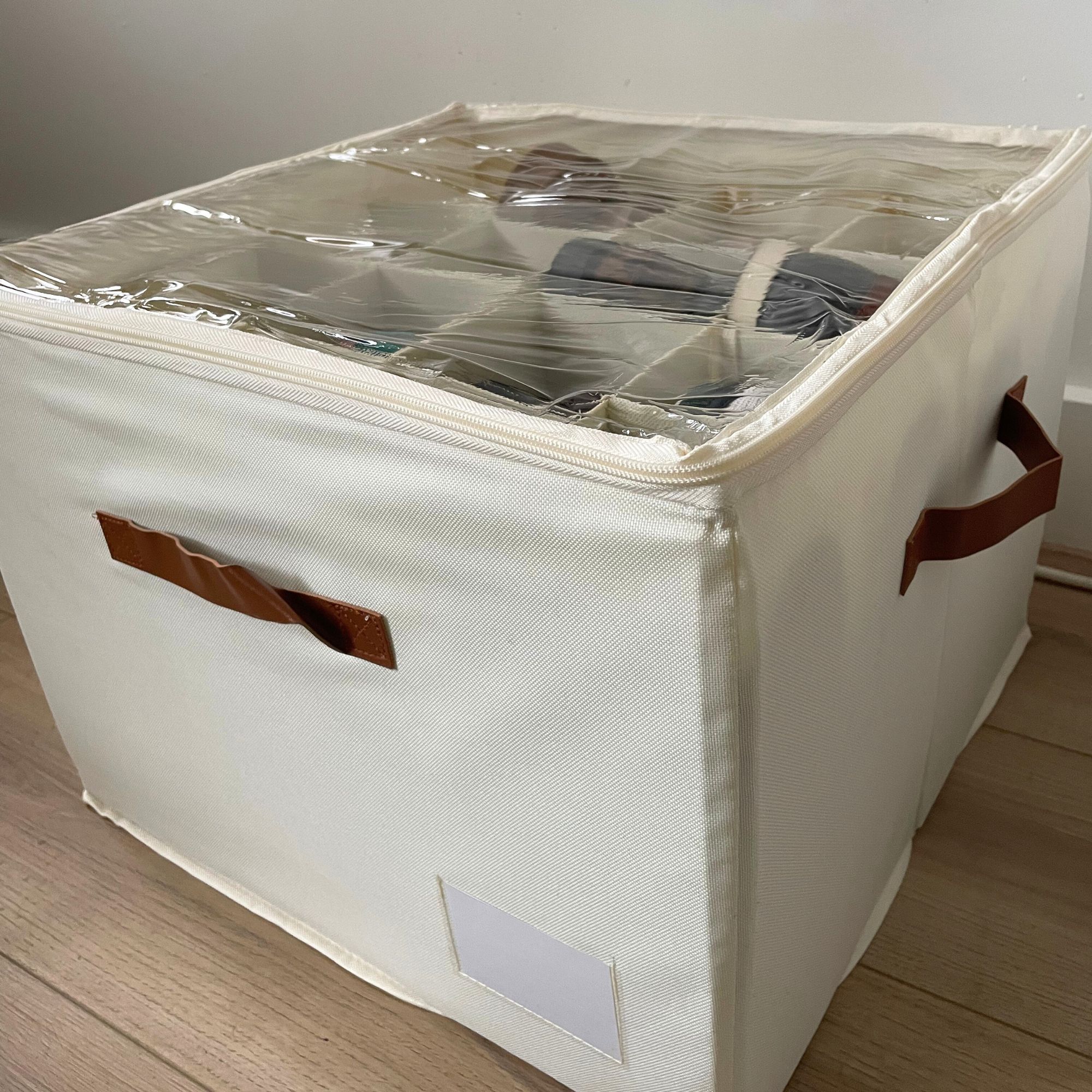 Cream Amazon shoe storage box with brown leather handles