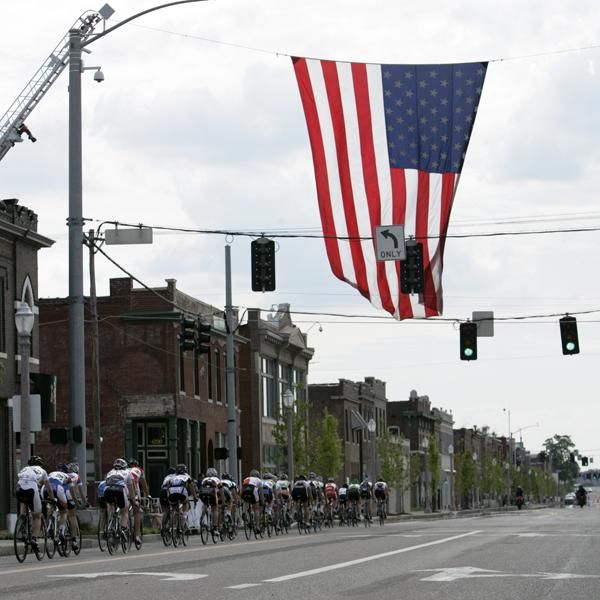 The women's field beneath Old Glory
