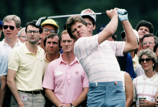 Nick Price plays an iron shot during the 1986 Masters