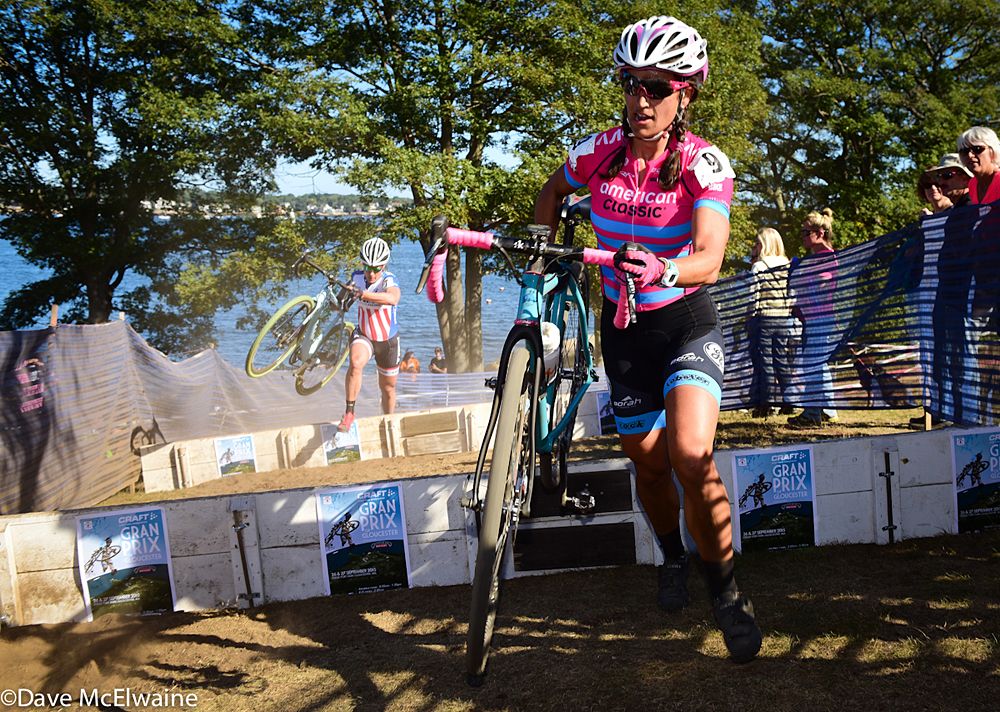 Courtenay McFadden (American Classic) leading Katie Compton over a set up uphill barriers