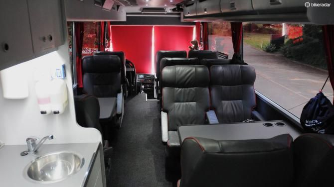 11 plush leather seats and a fold-down seat up front next to the driver cater for nine riders, manager, directeur sportif and the PR manager