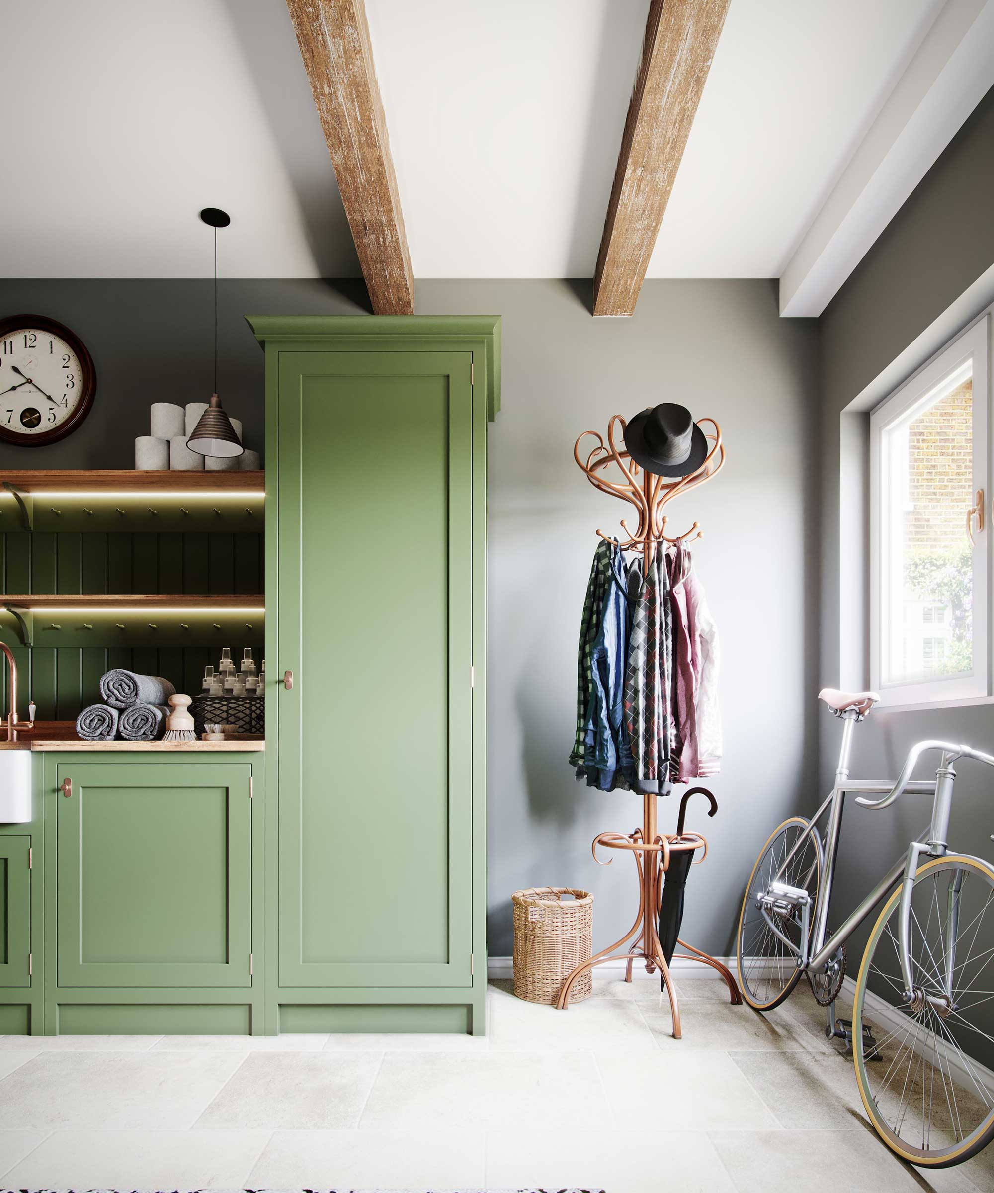 green boot room with built-in storage and coat stand