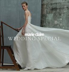 A bride in a flowing white dress with the words Marie Claire Wedding Special added ontop in a graphic overlay 