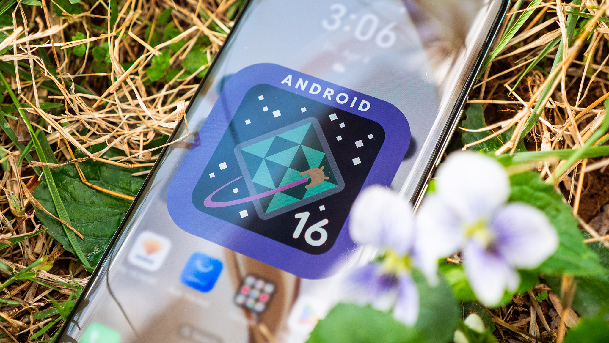 A purple and green Android 16 logo on an Honor 200 Pro