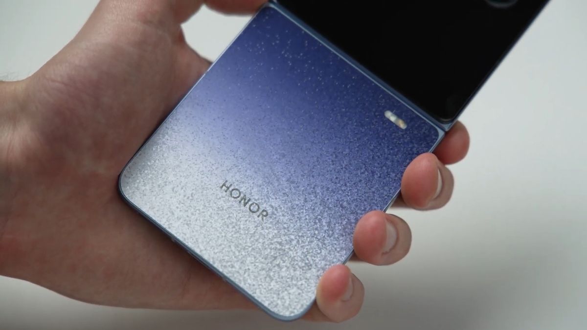 The Honor Magic V Flip 2 being held in the hand