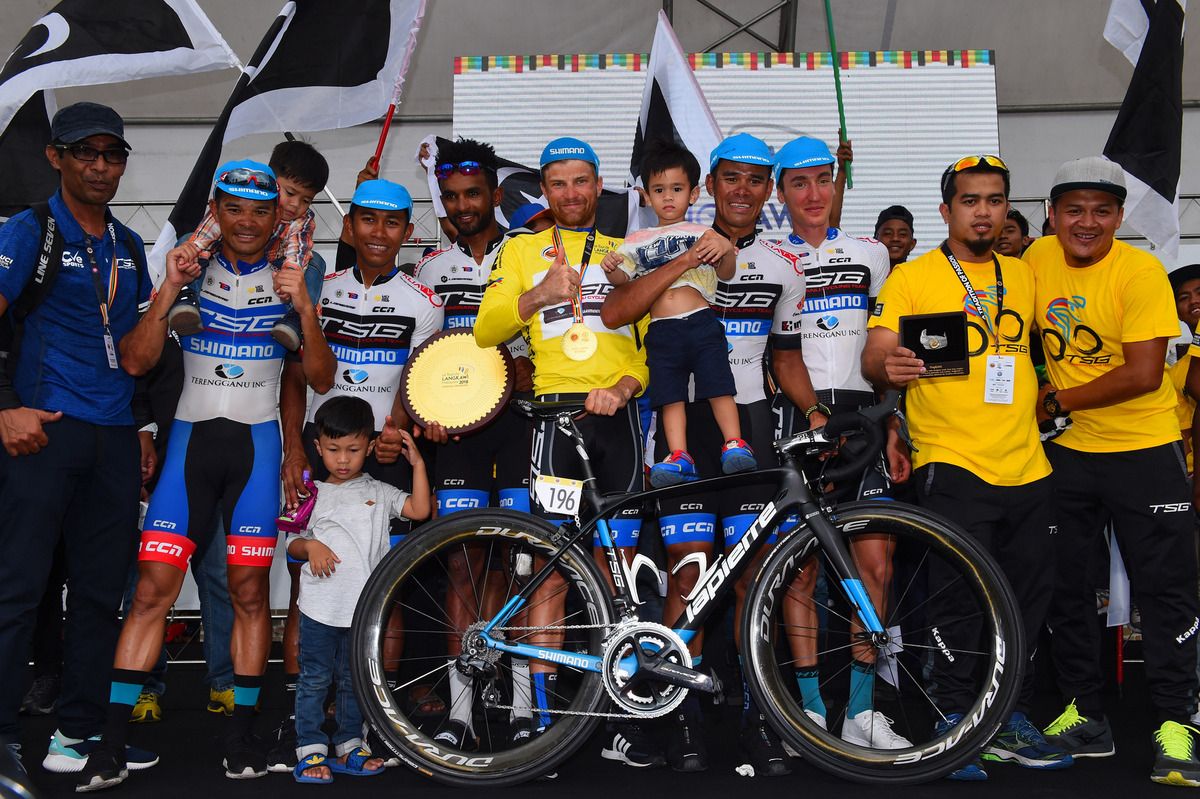 Artem Ovechkin and the Terengganu team on stage as race winners