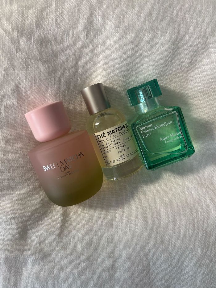 Some of the best matcha perfumes on a white linen background