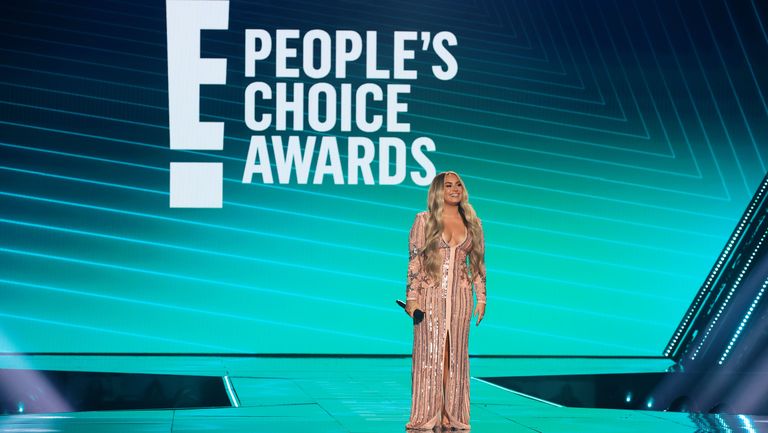 santa monica, california november 15 2020 e peoples choice awards in this image released on november 15, demi lovato speaks onstage for the 2020 e peoples choice awards held at the barker hangar in santa monica, california and on broadcast on sunday, november 15, 2020 photo by christopher polke entertainmentnbcu photo bank via getty images
