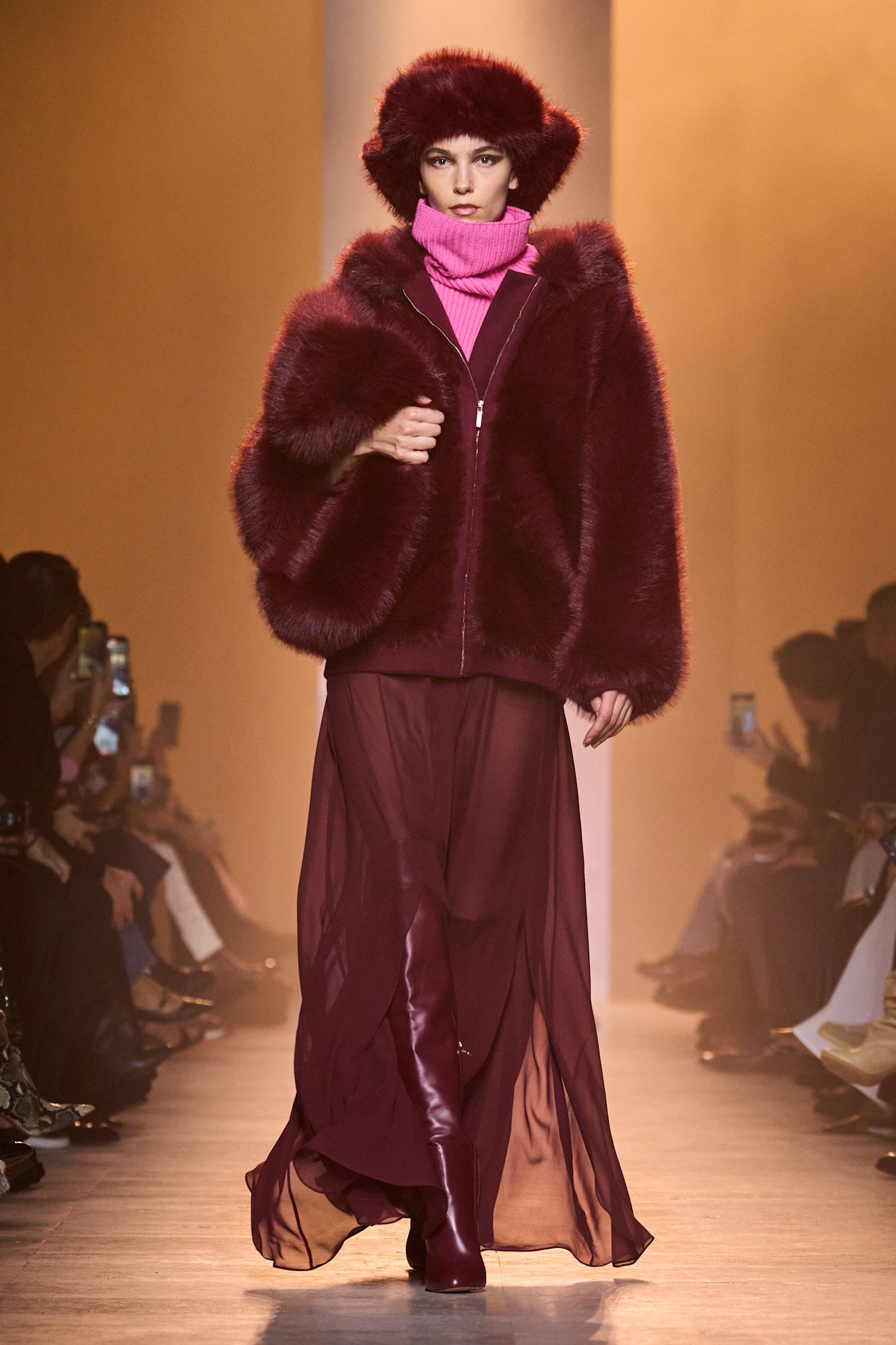 A model wears chili flake red on the Elie Saab Fall 2025 runway