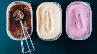How do freezers work, and do they kill bacteria: A picture of three tubs of ice cream sat next to one one, one chocolate, one vanilla, one strawberry