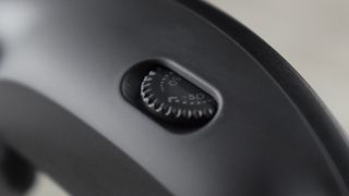 Close up of VITURE Pro XR Glasses myopia adjustment dial.