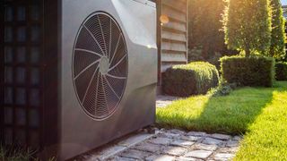 Air heat pump near pool house outdoors surrounded by grass lawn