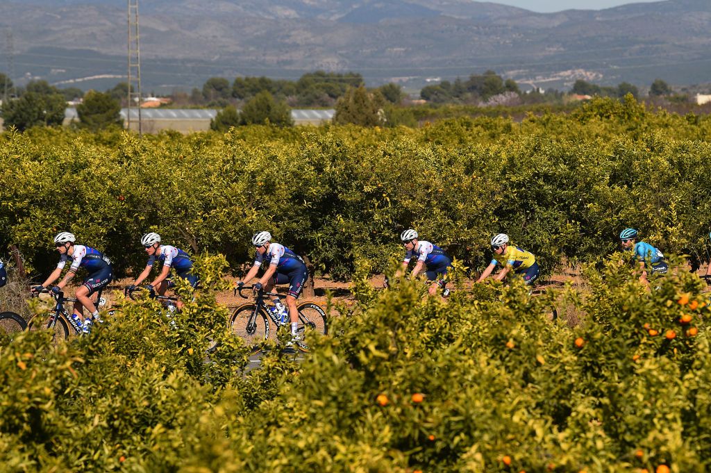 TORRENT SPAIN FEBRUARY 03 Remco Evenepoel of Belgium Leader Jersey with teammates compete during the 73rd Volta A La Comunitat Valenciana 2022 Stage 2 a 1715km stage from Btera to Torrent VCV2022 on February 03 2022 in Torrent Spain Photo by Dario BelingheriGetty Images