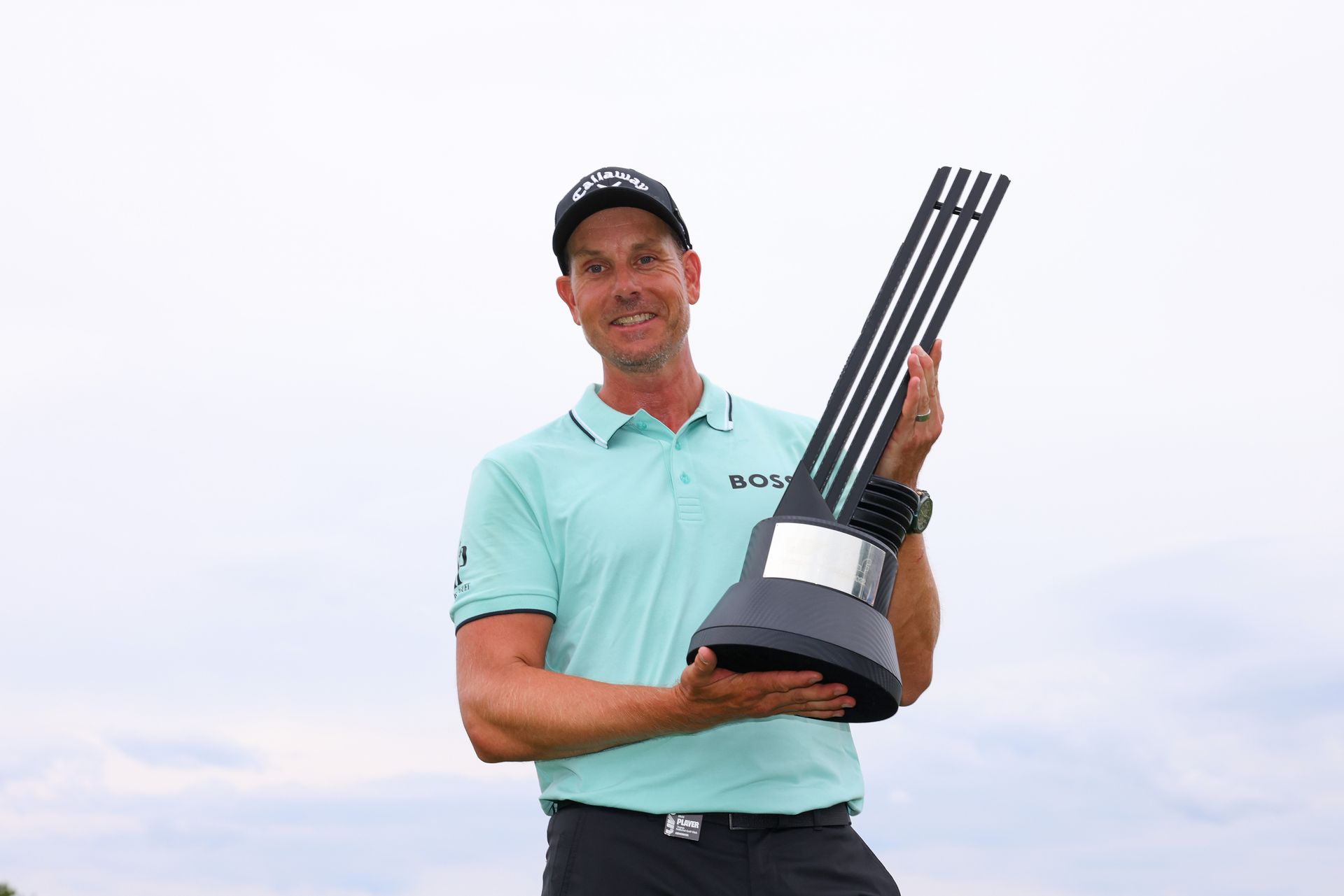 Henrik Stenson holds the trophy