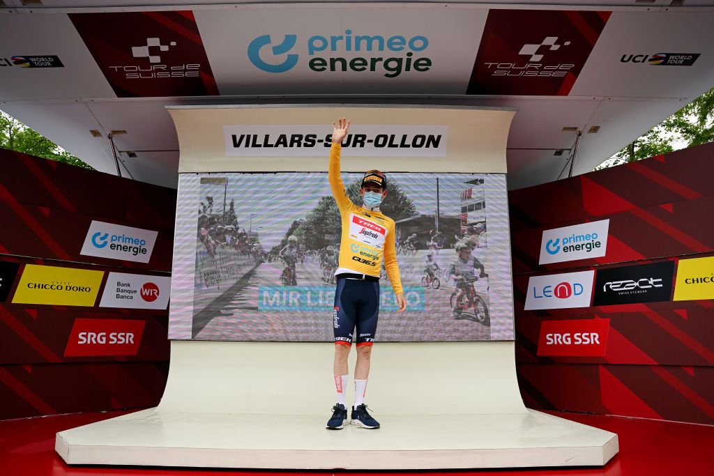 VILLARSSUROLLON SWITZERLAND JUNE 13 Mattias Skjelmose Jensen of Denmark and Team TrekSegafredo celebrates at podium as Yellow leader jersey winner during the 86th Tour de Suisse 2023 Stage 3 a 1438km stage from Tafers to VillarssurOllon 1256m UCIWT on June 13 2023 in VillarssurOllon Switzerland Photo by Dario BelingheriGetty Images