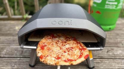 Pizza on a peel in the Ooni Koda 14 2nd Generation