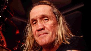 Nicko McBrain posing for a photograph