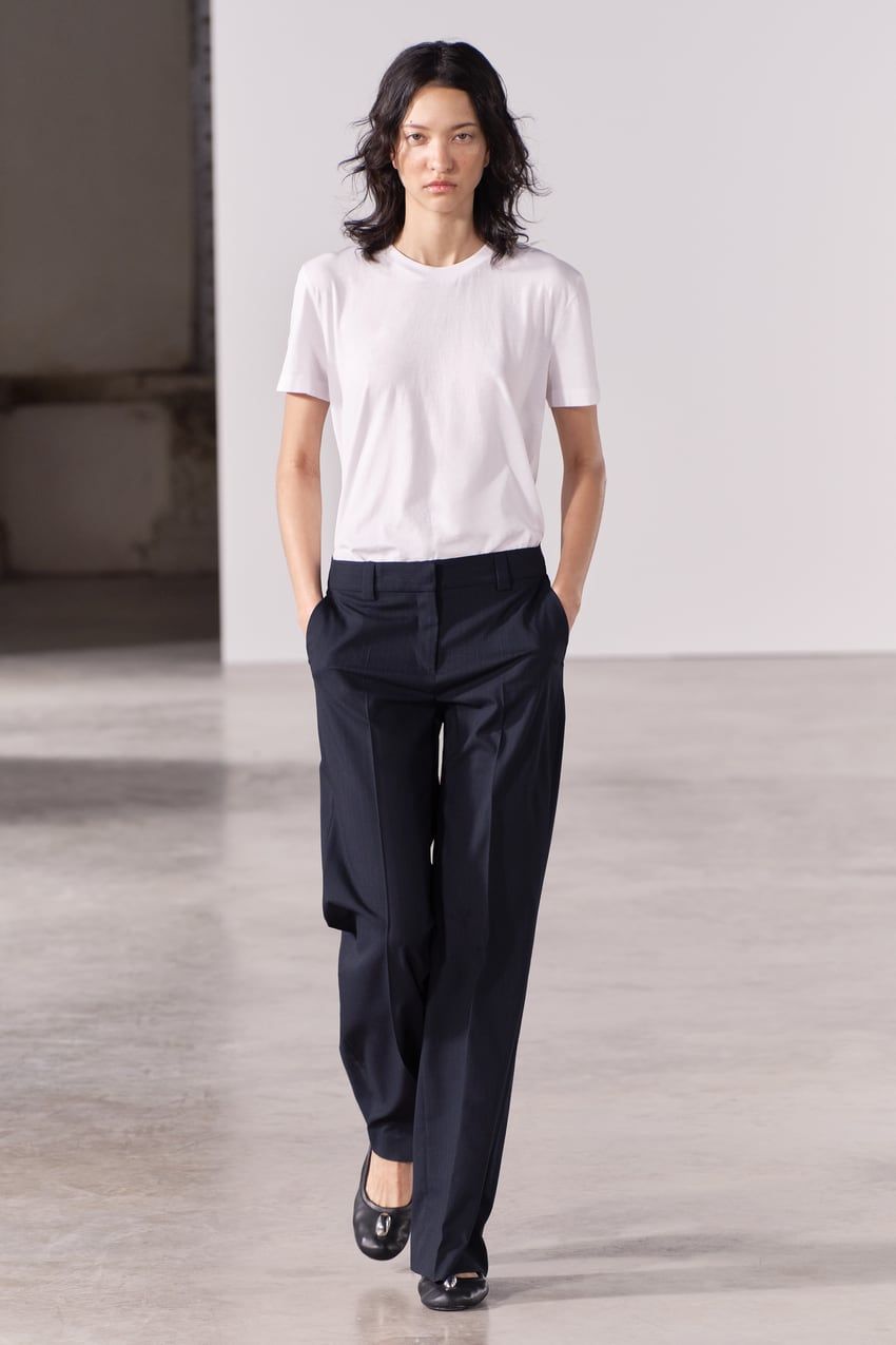 Model wears Zara pinstripe trousers