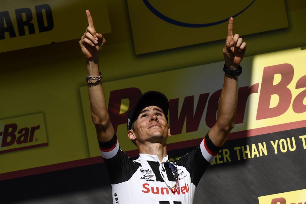 Warren Barguil on the Tour de France podium after winning stage 18