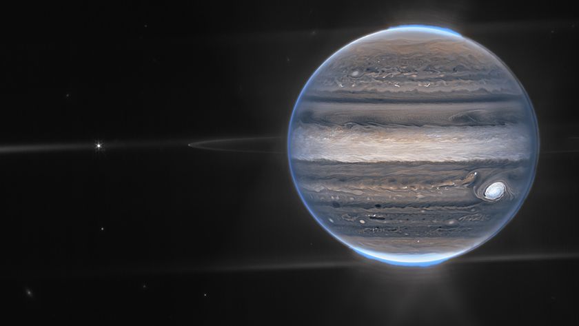 A marble-like planet in space, against the darkness of the cosmos, with a blue glowing light all around it.