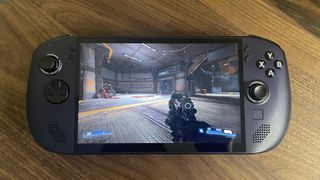 A Lenovo Legion Go S handheld with SteamOS in Nebula Nocturne colour scheme