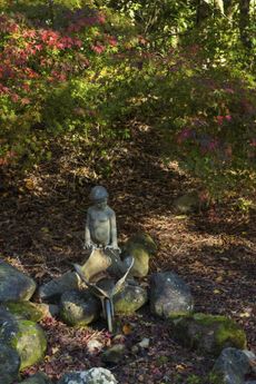 Statue In A Garden