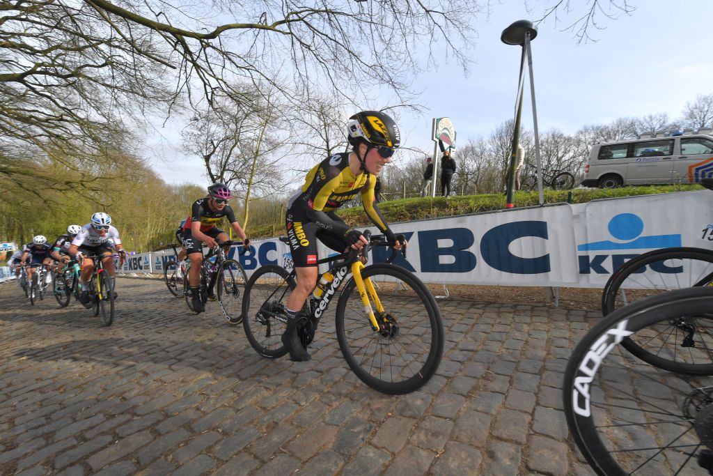 Peloton on a cobbled climb in Gent-Wevelgem