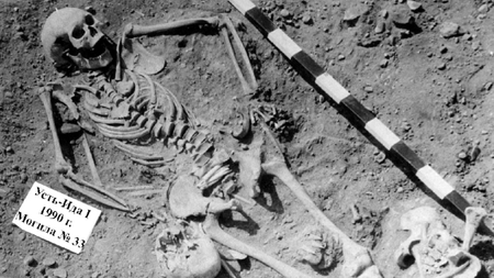 Black and white image of the skeletal remains of a plague victim