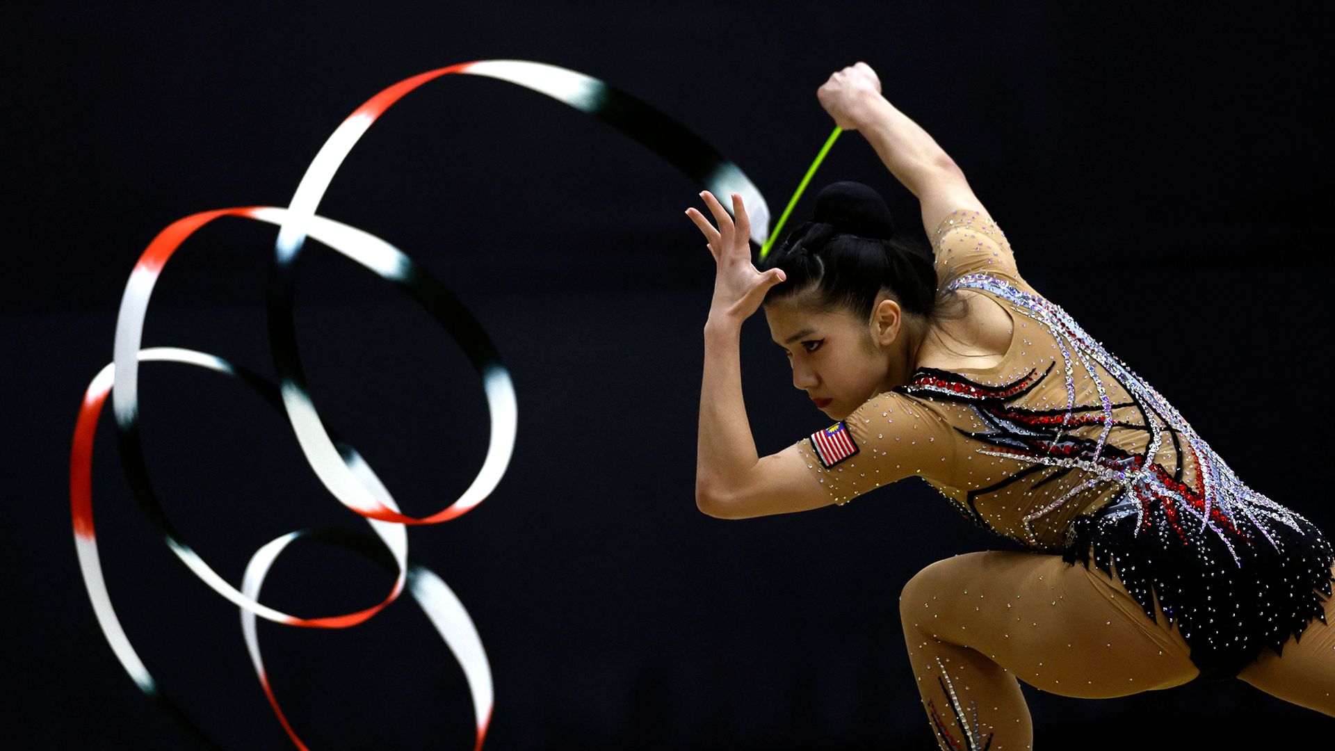
                                Rhythmic gymnast Ng Joe Ee of Malaysia competes during the 2025 Southeast Asian Games in Rangsit, Thailand
                            