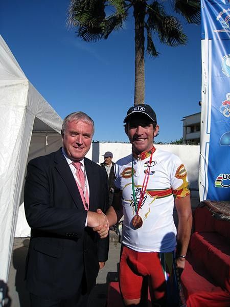 African Road Champion Dan Craven (Namibia) is congratulated by UCI President Pat McQuaid