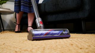 Dyson V8 vacuum cleaner in use