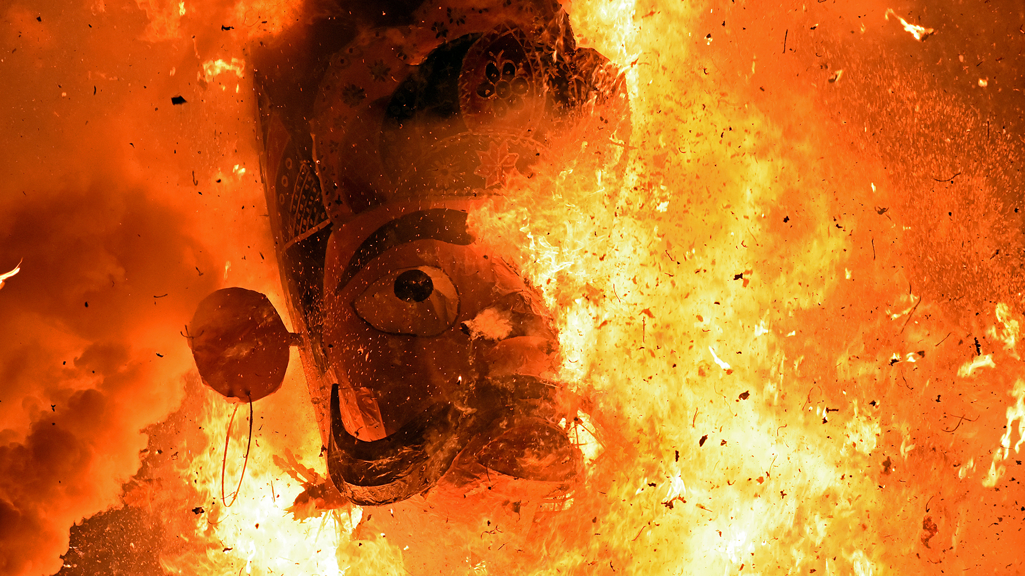 An effigy of Ravana, a demon king in Hindu scripture, is set ablaze during Dussehra festival celebrations at the Sher-e-Kashmir Cricket Stadium in Srinagar, Jammu and Kashmir, India