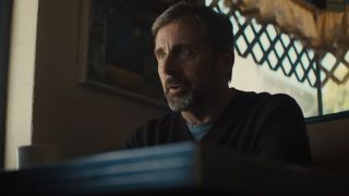 Steve Carell sitting at a booth in a restaurant in Beautiful Boy