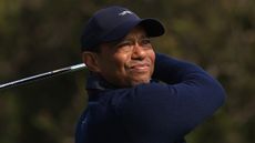 Tiger Woods takes a shot at the Genesis Invitational