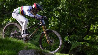 Charlie Hatton in his rainbow jersey riding at Red Bull Hardline 2024