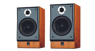 Two ATC SCM11 speakers on a white background